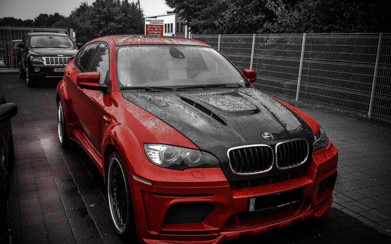 red bmw x6 with carbon hood