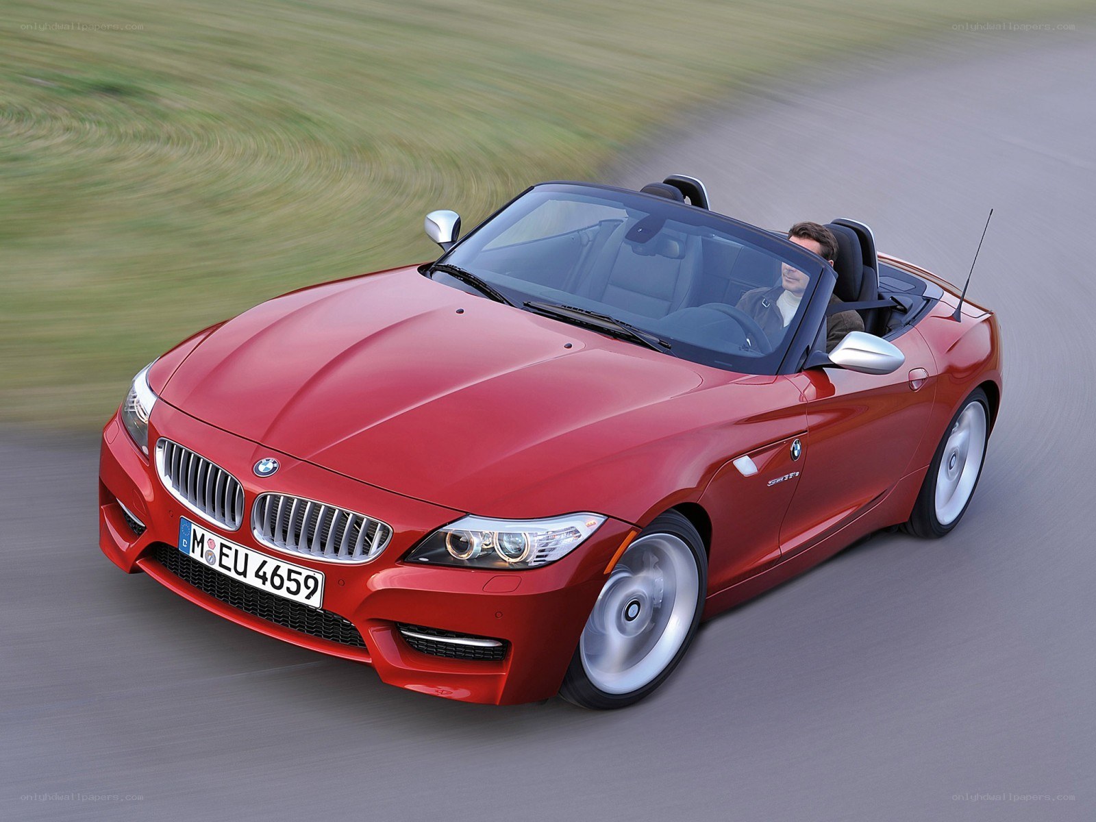 Red BMW Z4 convertible in motion