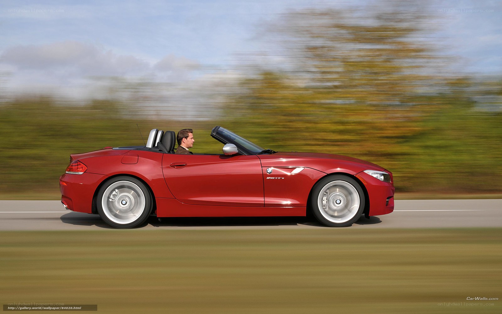 Red BMW Z4 convertible in motion