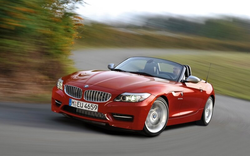 Red BMW Z4 convertible in motion