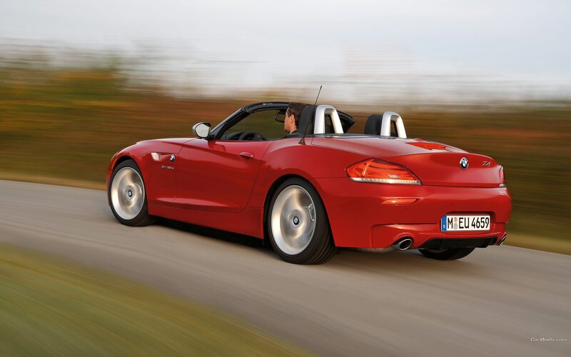 Red BMW Z4 convertible in motion