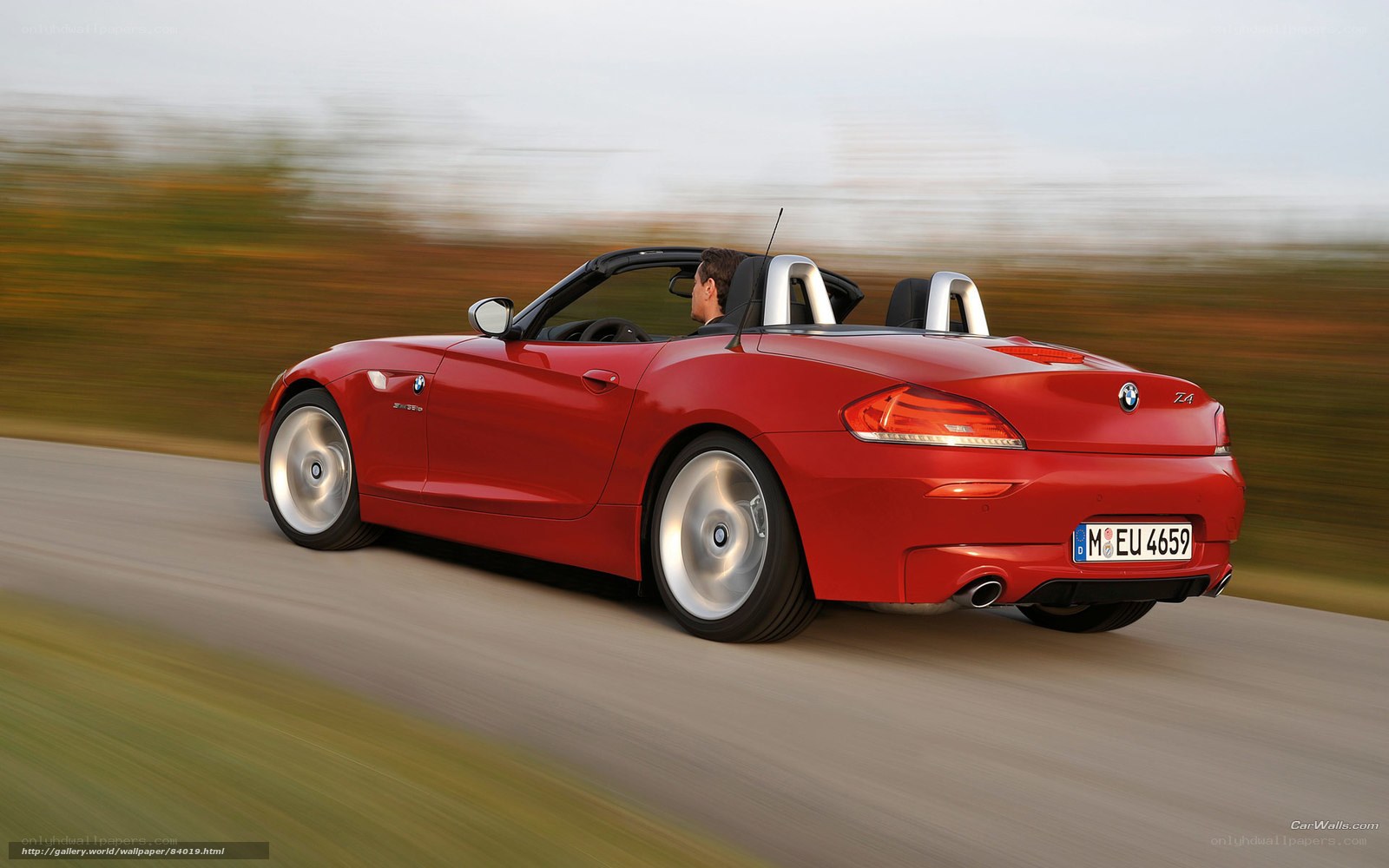 Red BMW Z4 convertible in motion