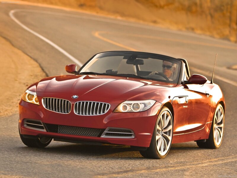 Red BMW Z4 convertible on road