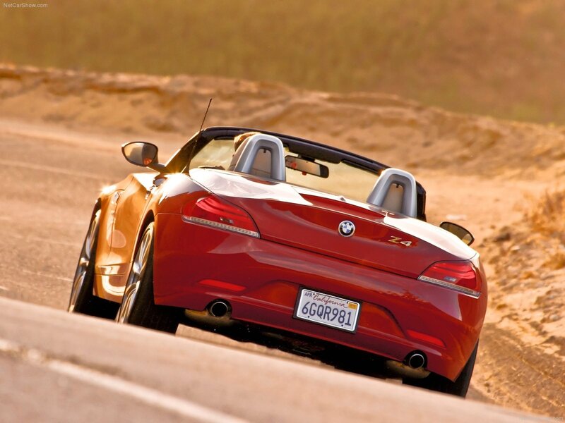 Red BMW Z4 convertible on road