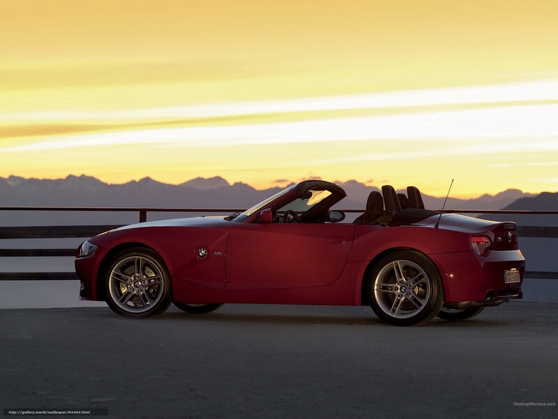 Red BMW Z4 M Roadster at sunset