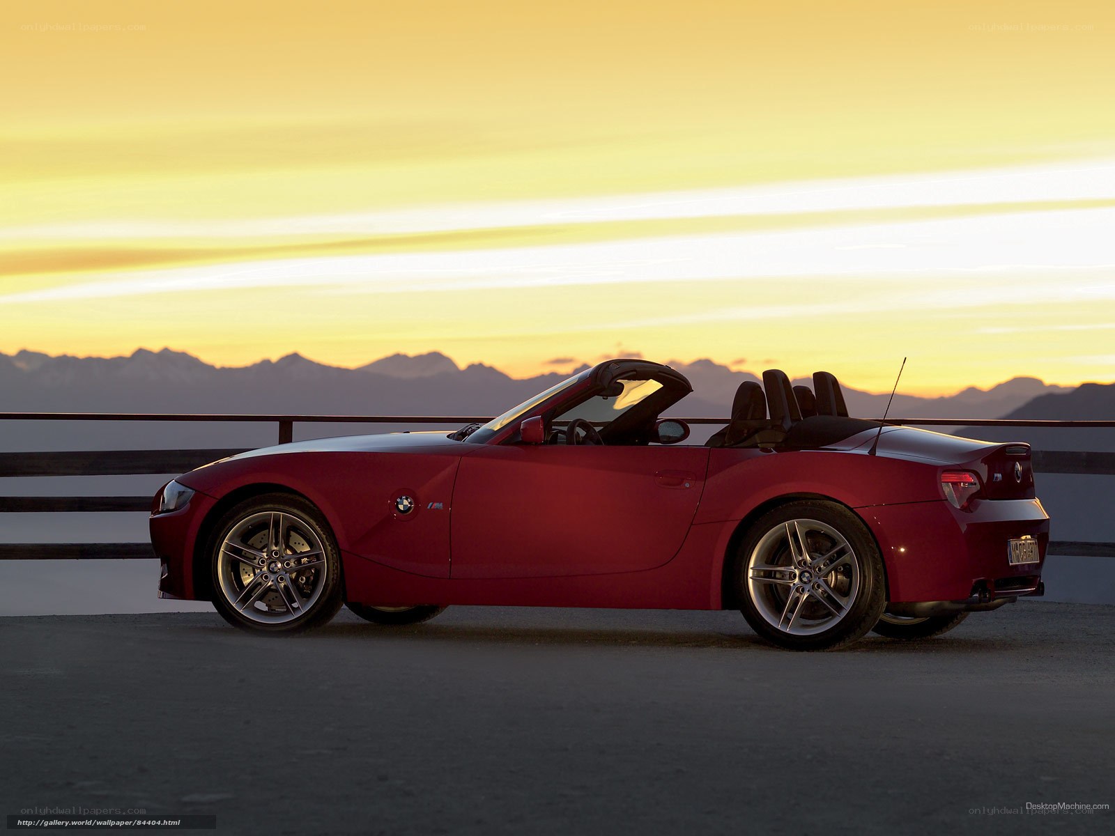 Red BMW Z4 M Roadster at sunset