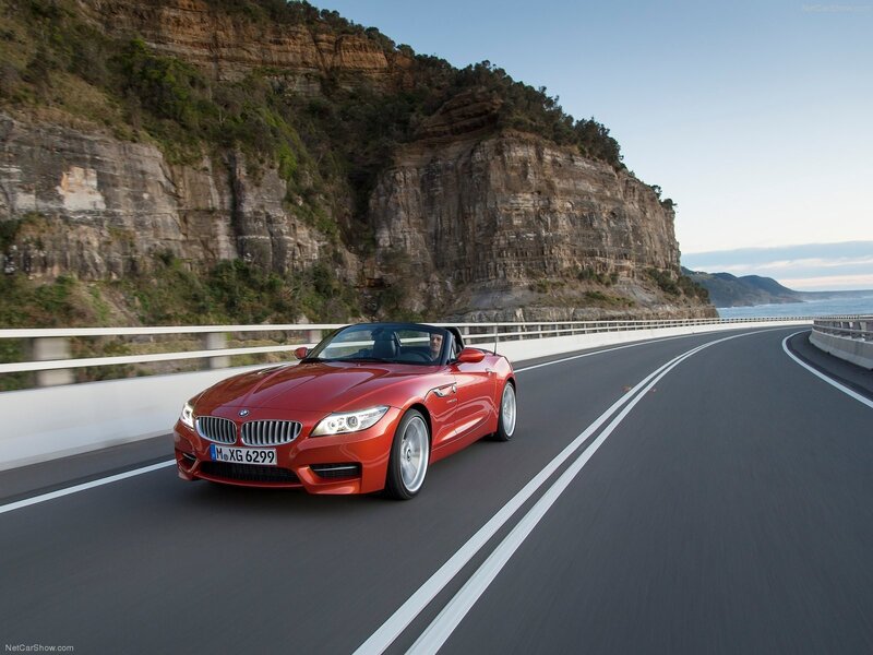 Red BMW Z4 on coastal road