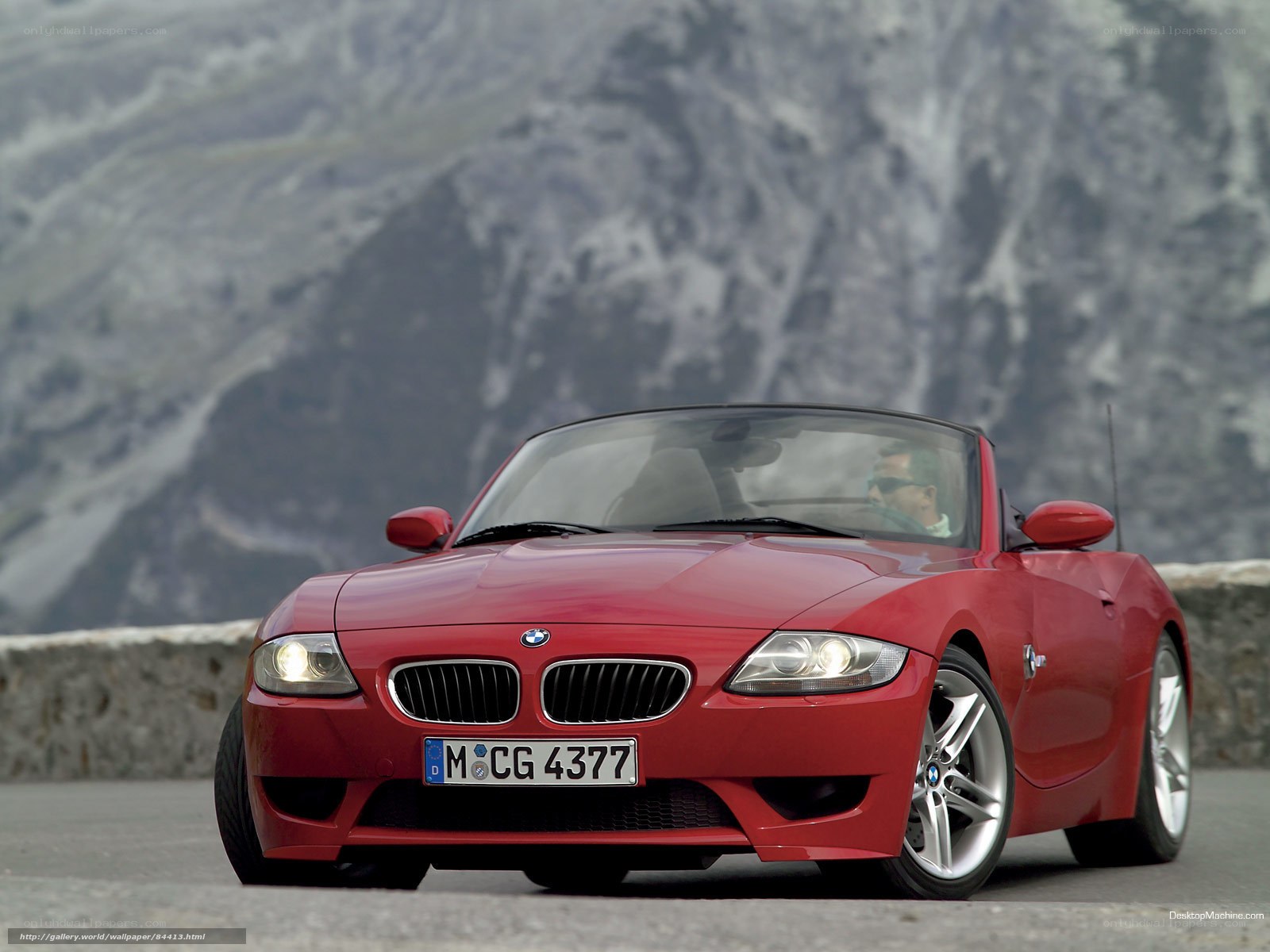 Red BMW Z4 on mountain road