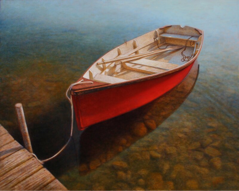 Red boat at a wooden dock