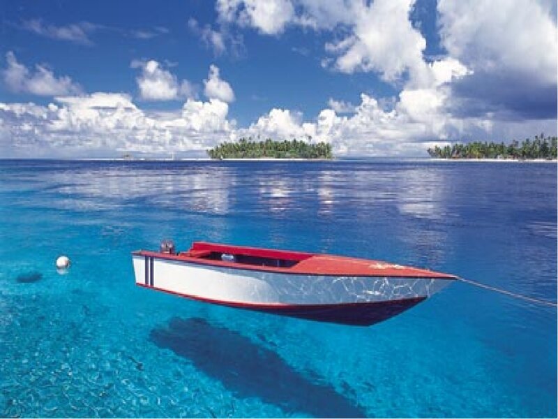 Red Boat in Blue Water