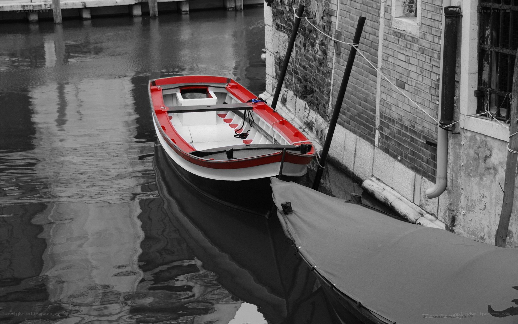 Red boat in canal