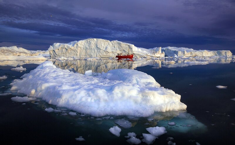 Red Boat Near Icebergs