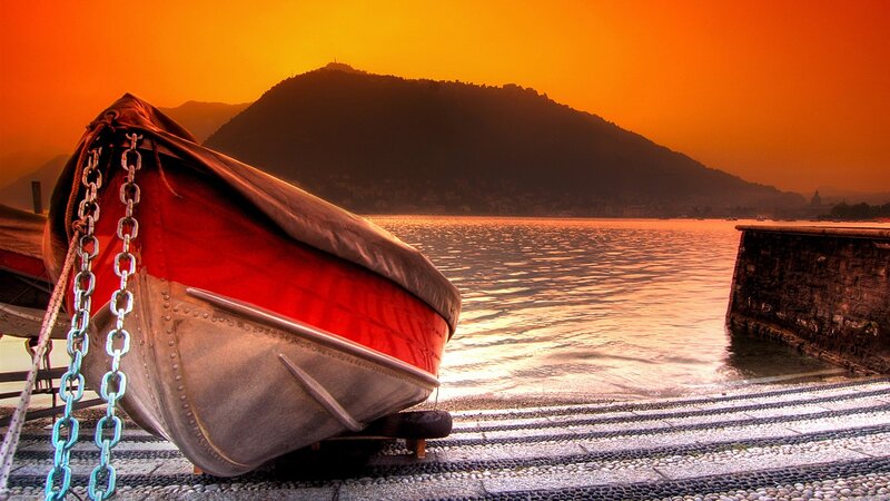 Red Boat on Dock — Orange, Dramatic