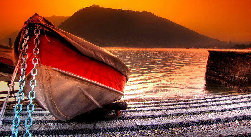 Red Boat on Dock — Orange
