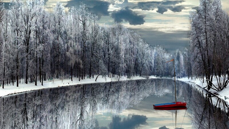 Red boat on frozen river