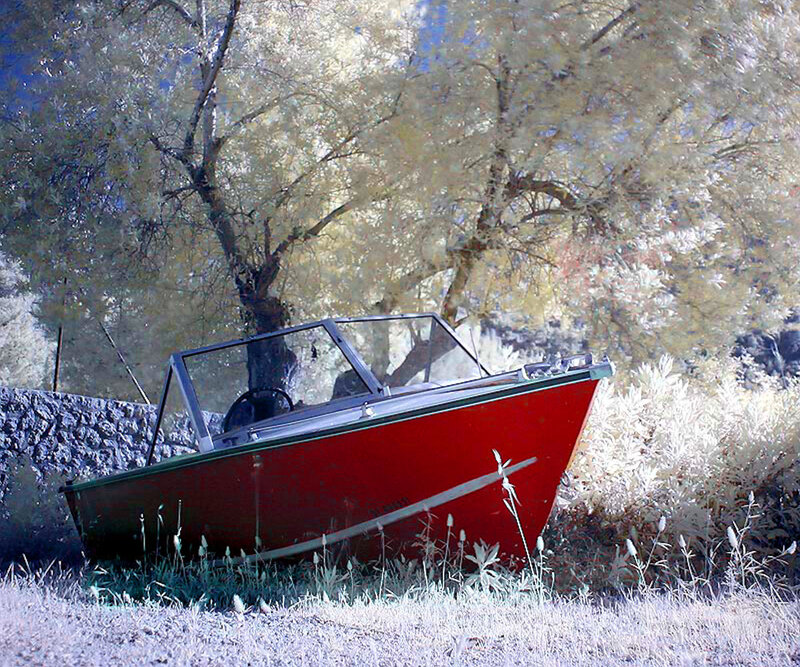 Red Boat on Grass