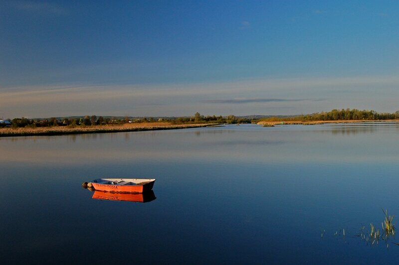 Red Boat on Lake — Blue, Serene, Sunset, Photograph, Sky