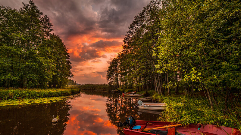 Red Boat on River — Orange
