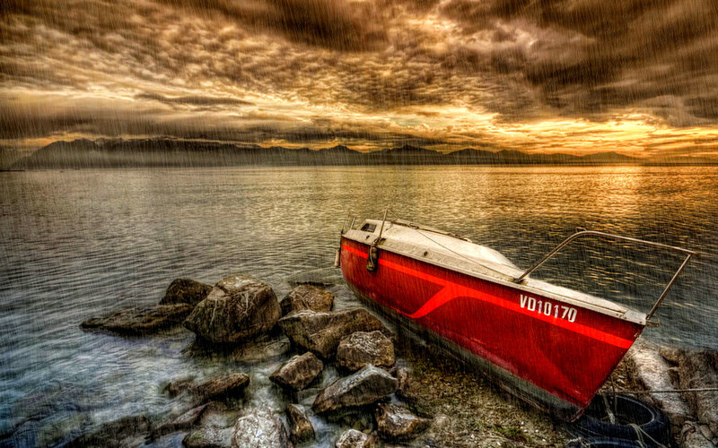 Red Boat on Rocks