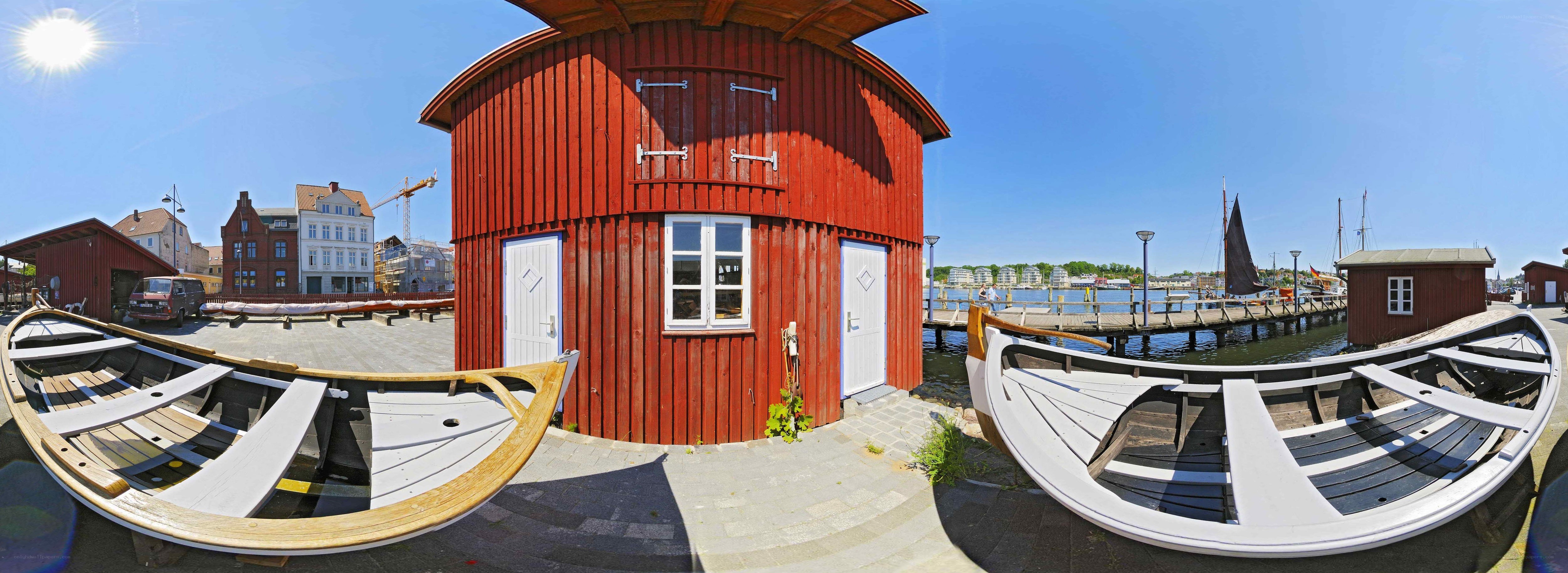 Red boathouse by the harbor