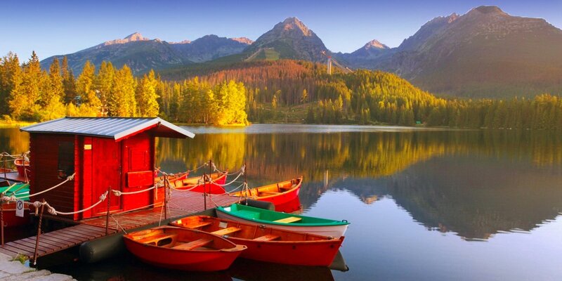 Red Boats at Lake Shore — Serene