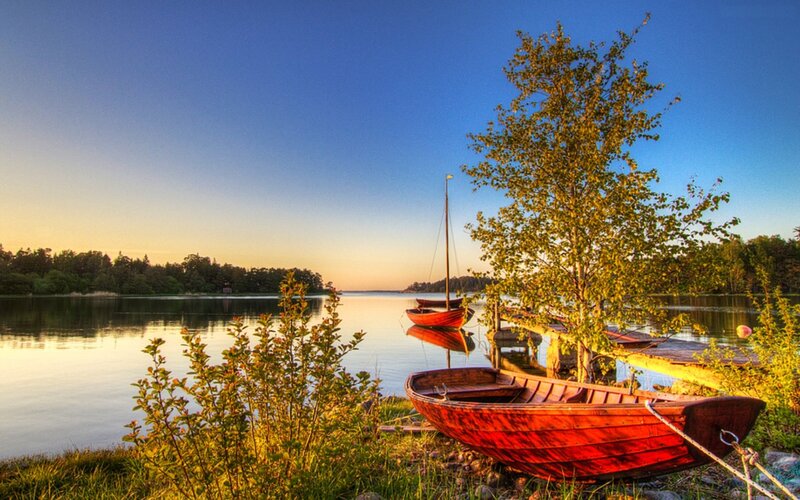Red Boats on Lake Shore — Blue