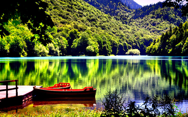 Red Boats on Lake