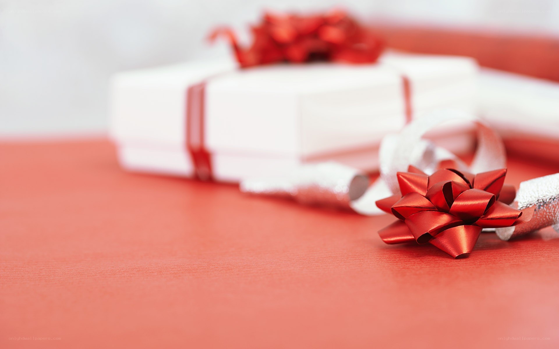 Red bows on gift boxes