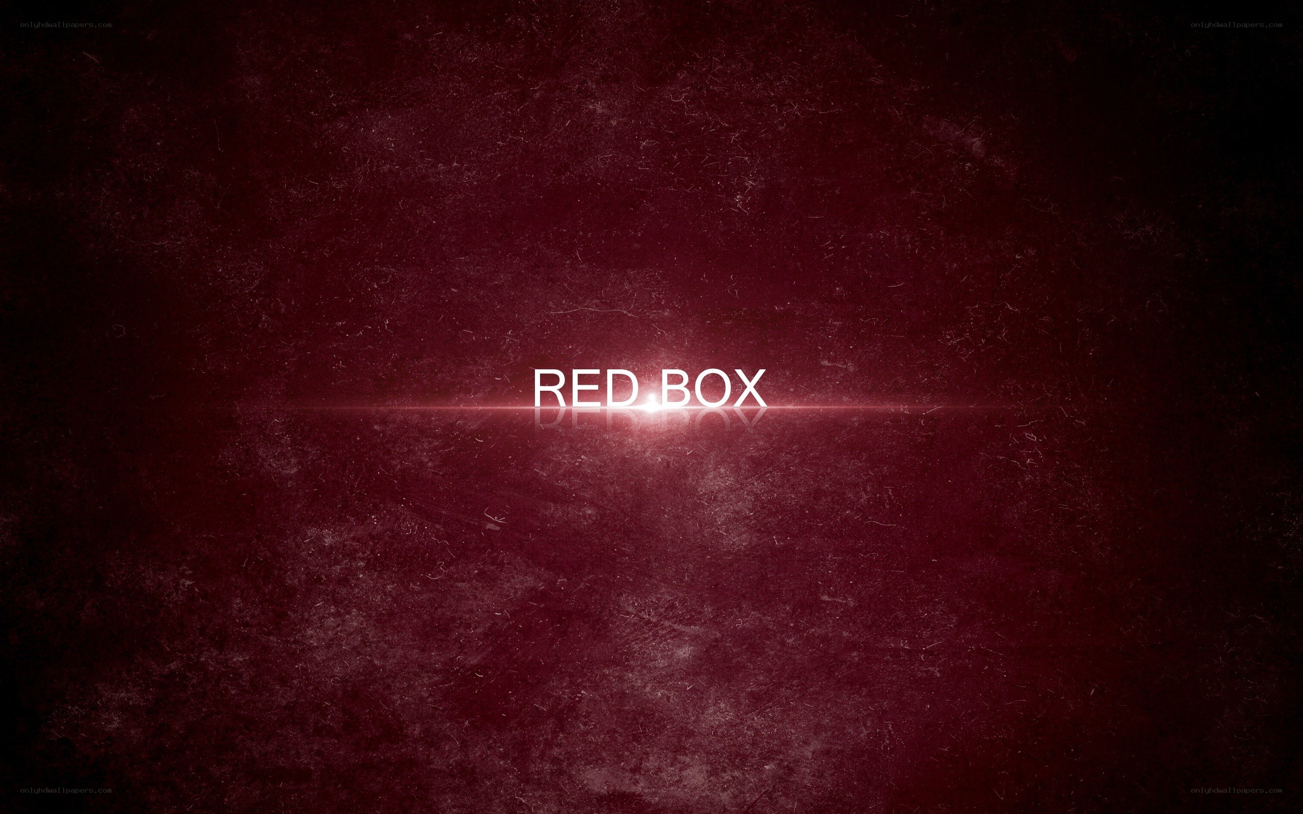 Red Box text on dark background