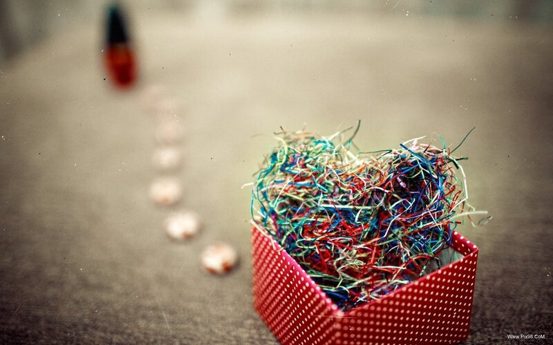 Red Box with Shredded Paper
