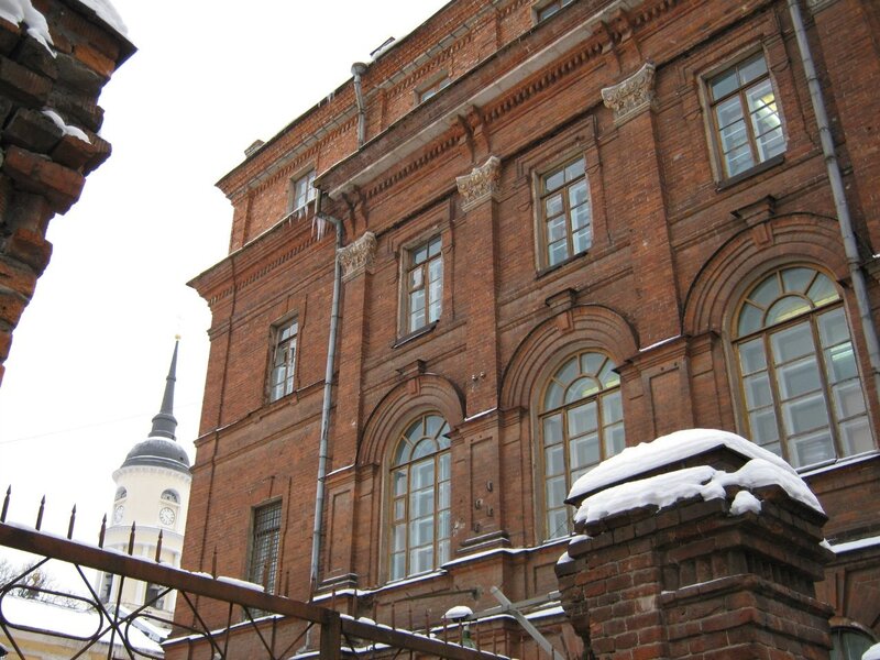 Red brick building with snow