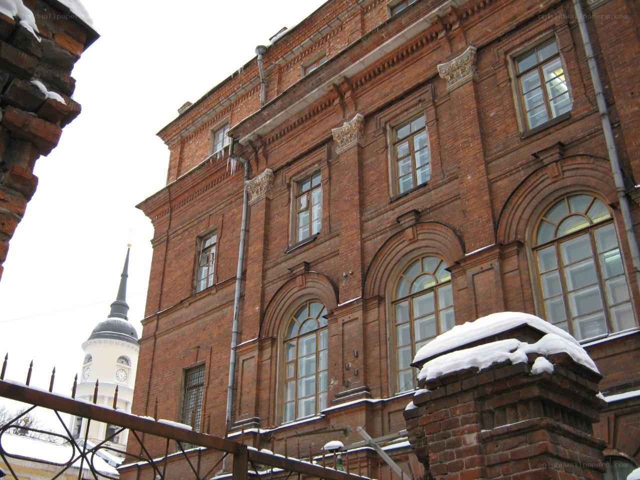 Red brick building with snow
