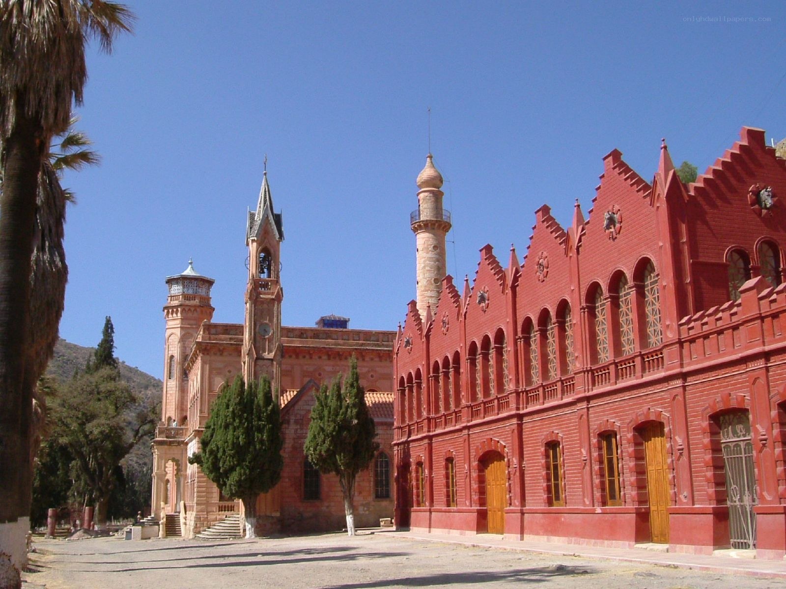 Red brick building with towers