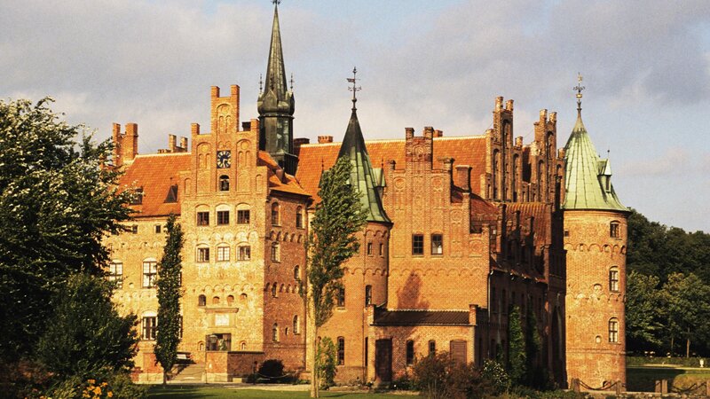 Red-brick Castle — Brown, Serene, Afternoon, Photograph, Towers, Trees