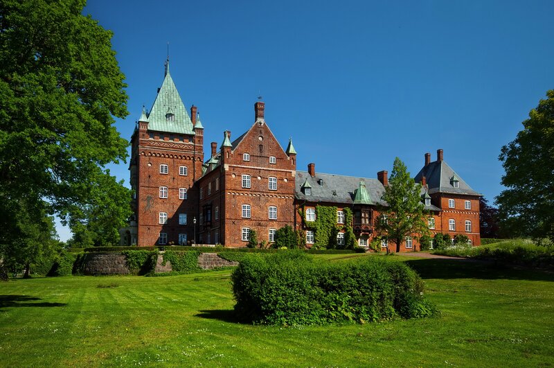 Red brick castle with green roof