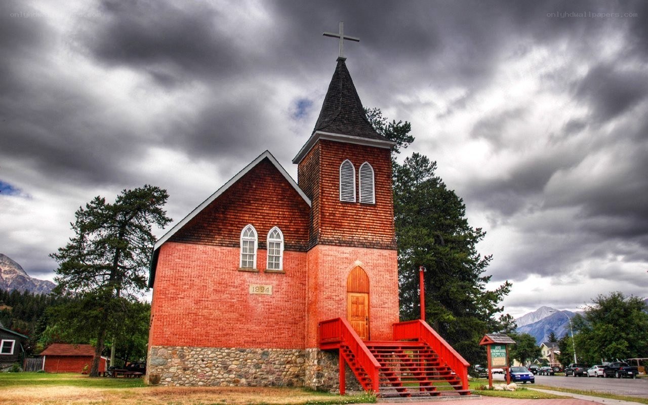 Red brick church with steeple