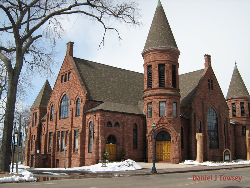red brick church with towers