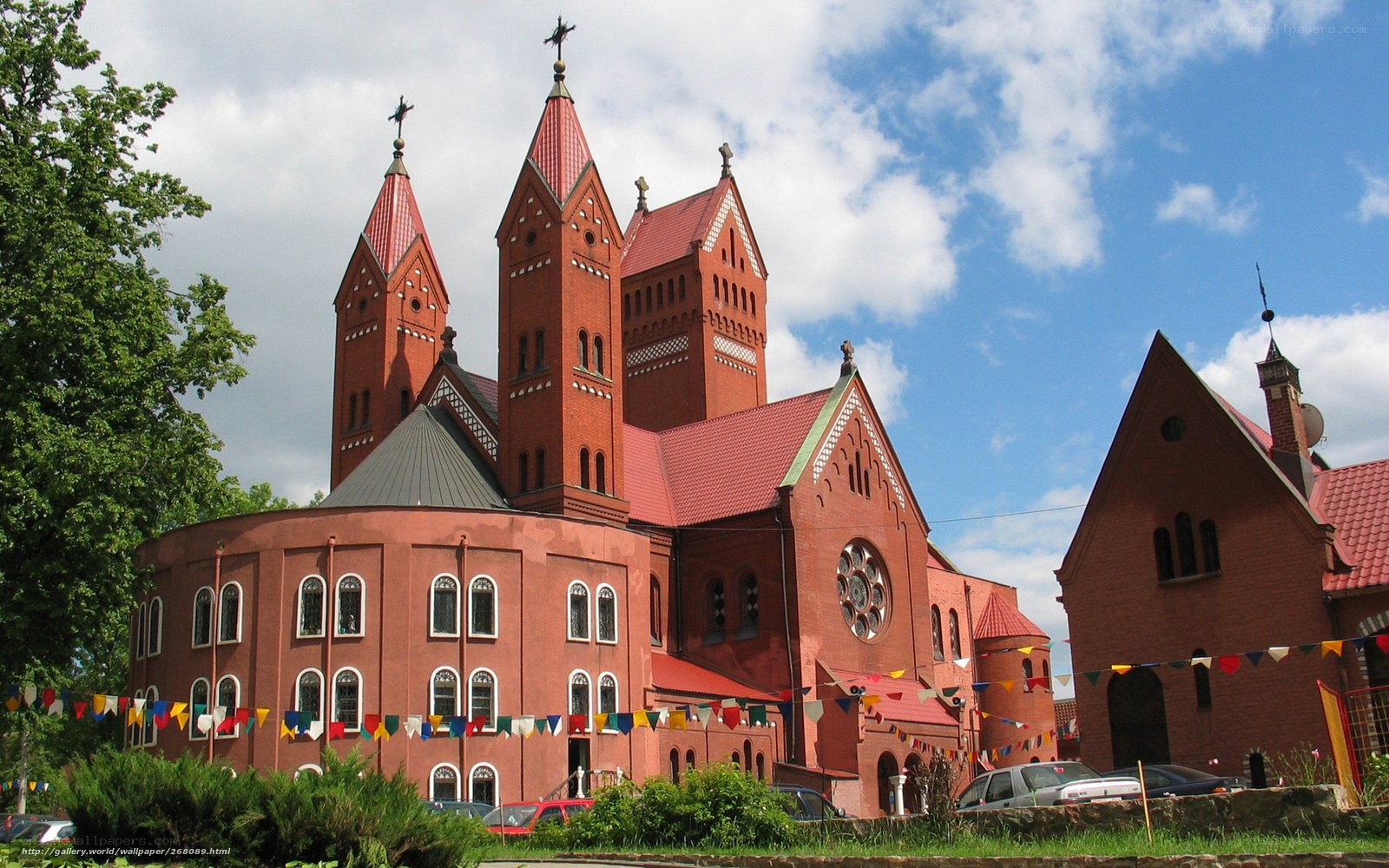 Red brick church with towers