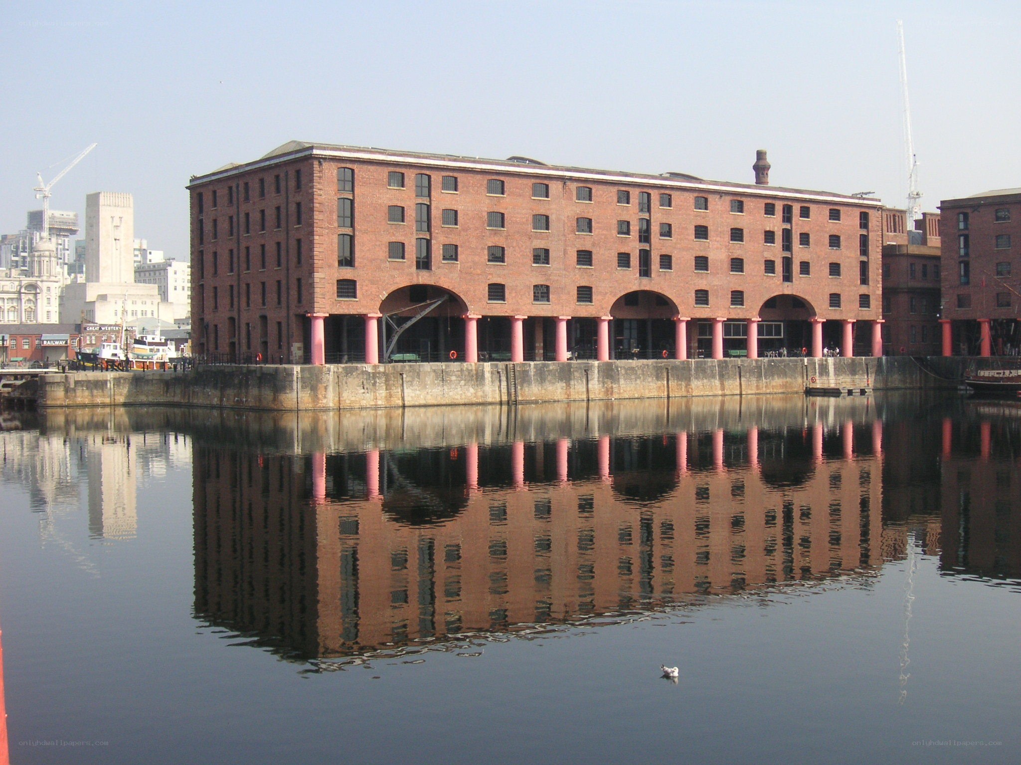 red brick warehouse by the water