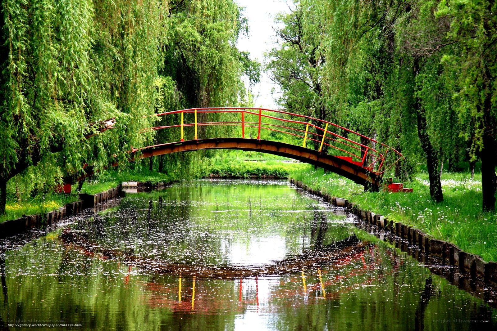 Red bridge over canal