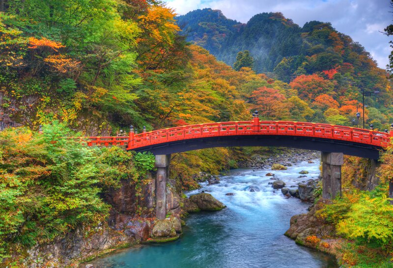 Red Bridge over River — Serene, Autumn
