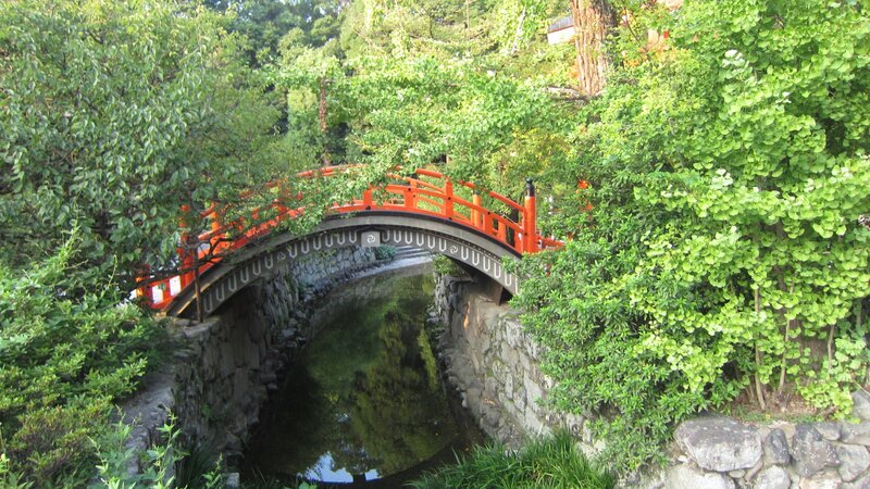 Red Bridge over Stream — Green, Serene