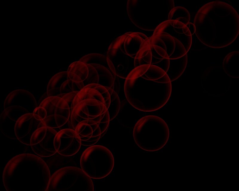 Red bubbles on black background
