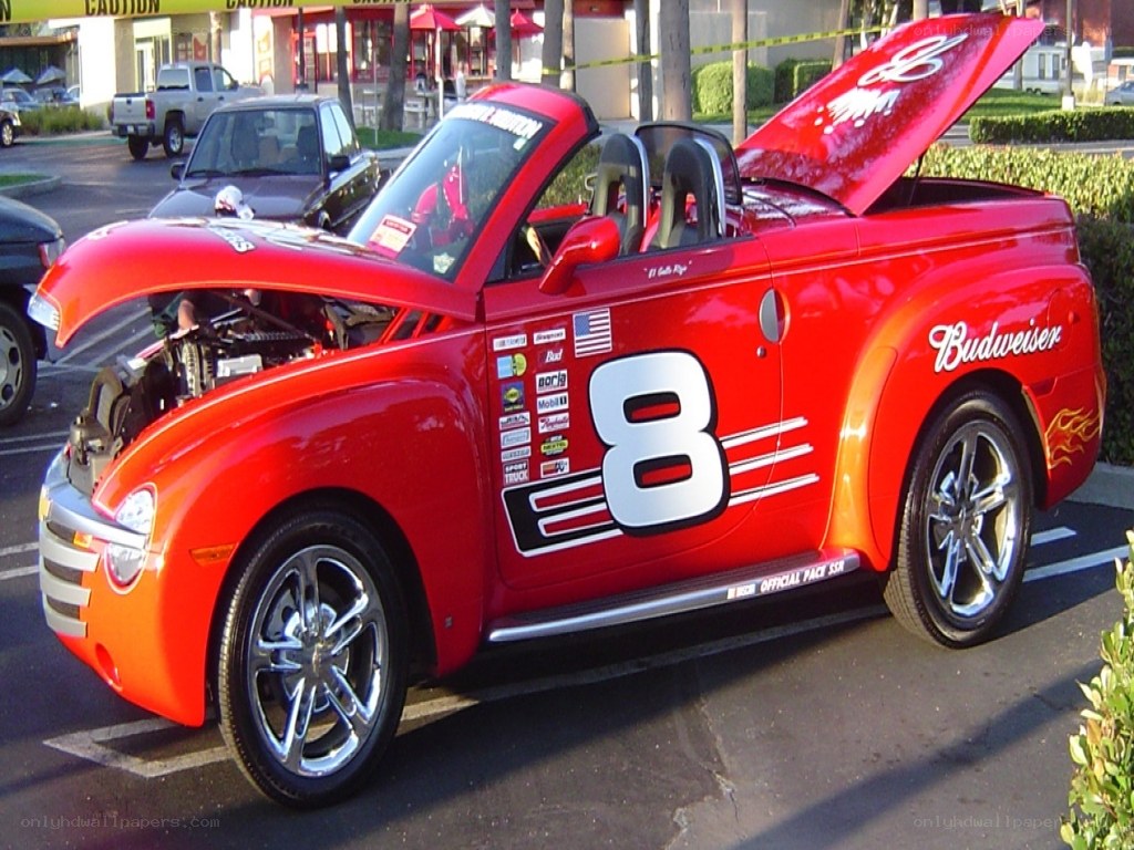 red budweiser car with open hood