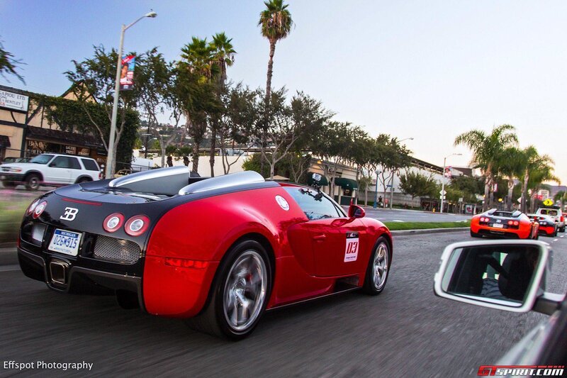 Red Bugatti Veyron on city street