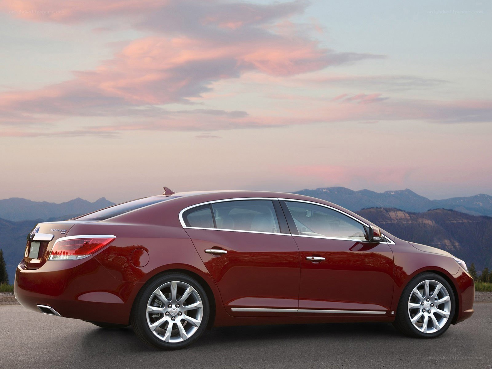Red Buick Lacrosse at sunset