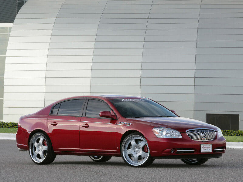 Red Buick Lucerne — Neutral, Afternoon, Photograph, Car, Building, Wheel