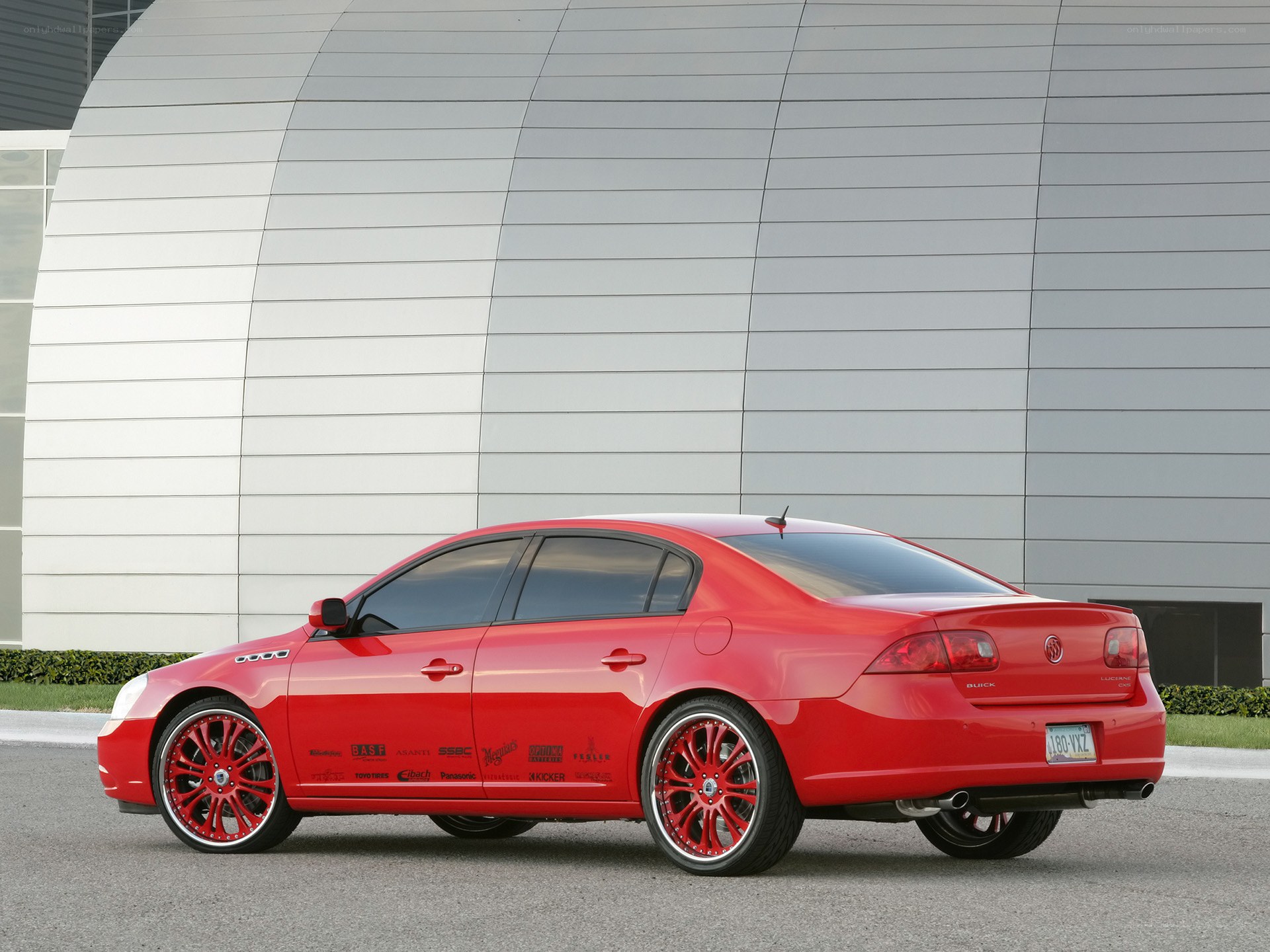 Red Buick Lucerne sedan