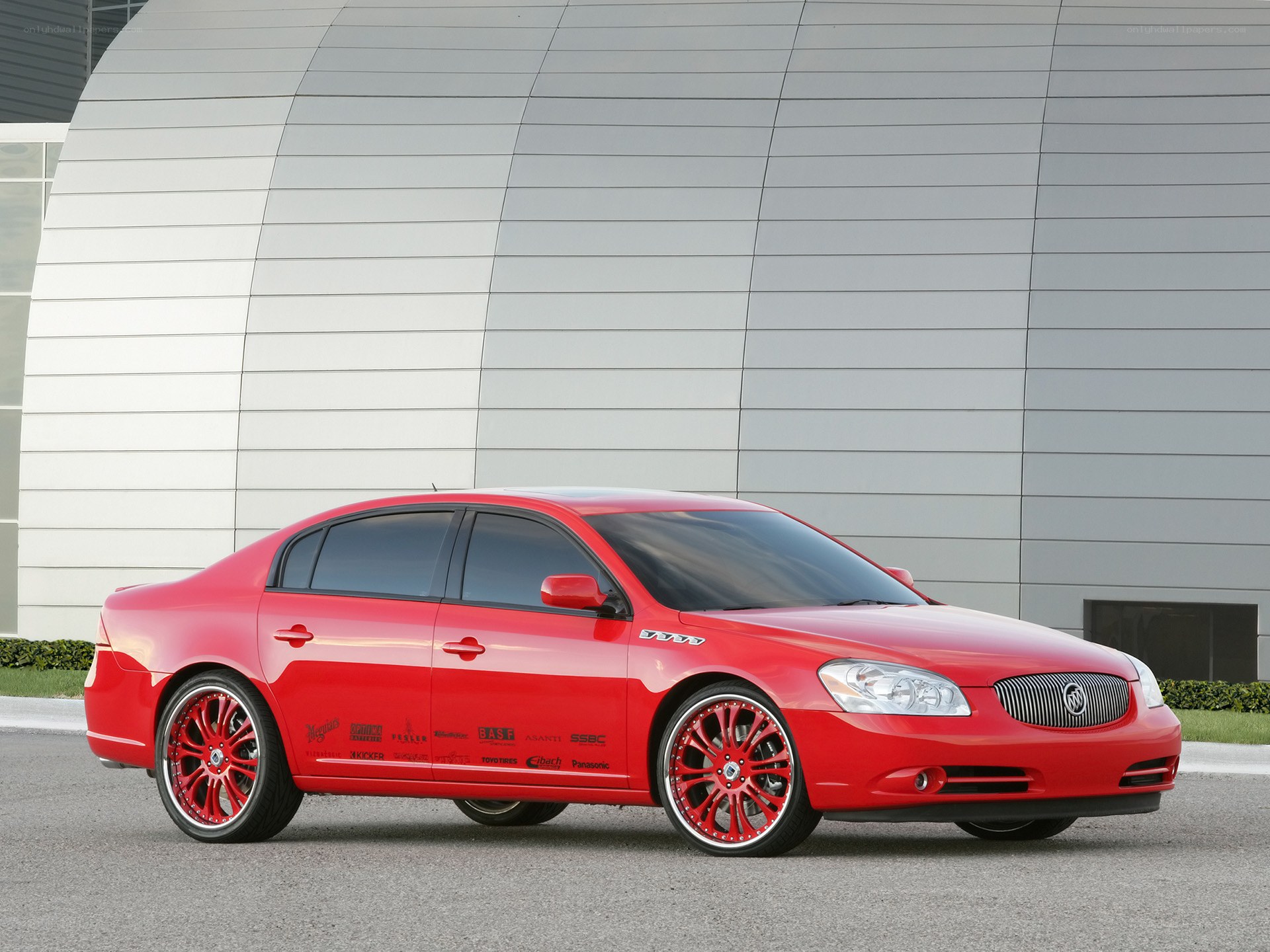 Red Buick Lucerne sedan
