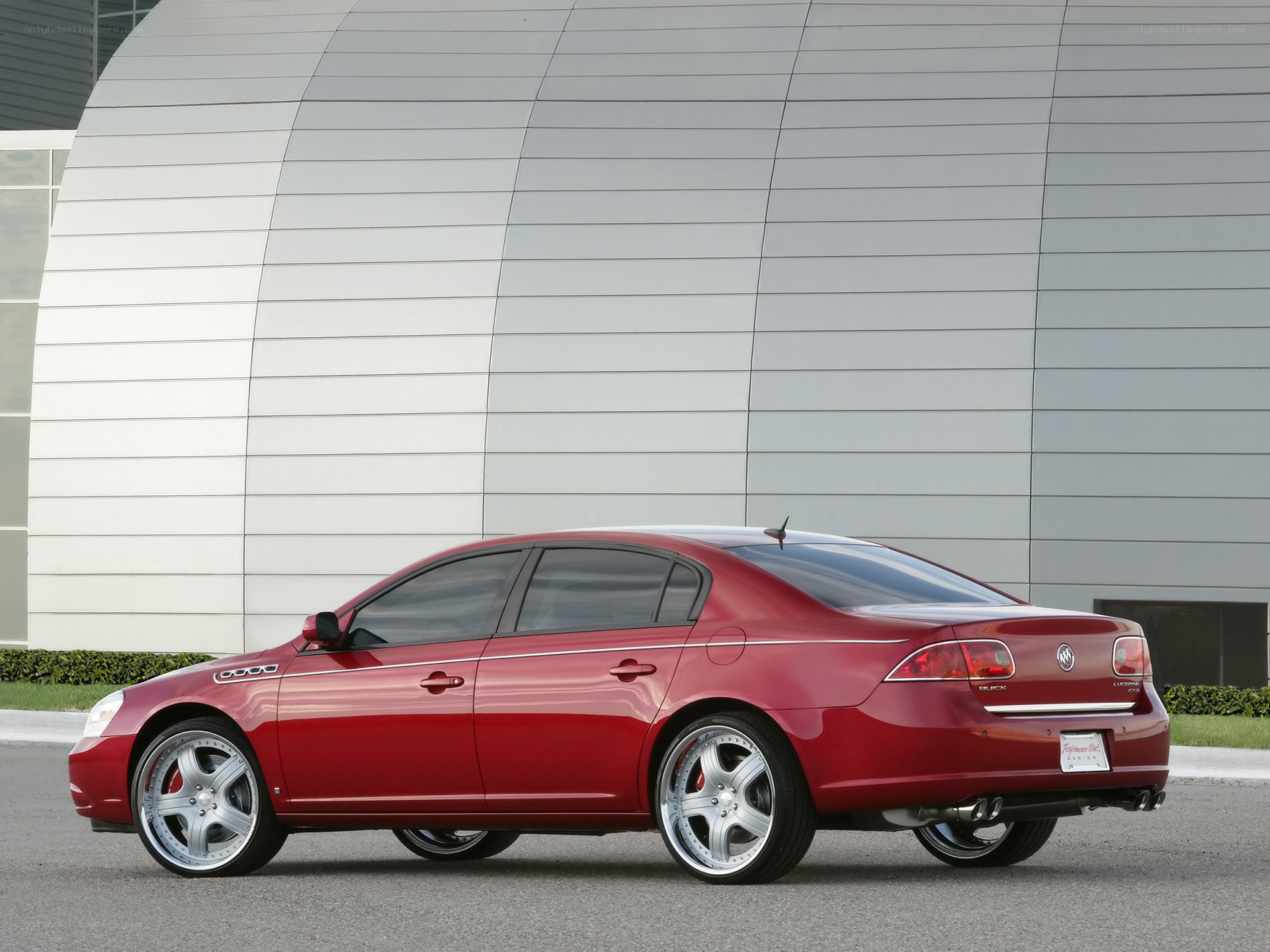 Red Buick Lucerne sedan